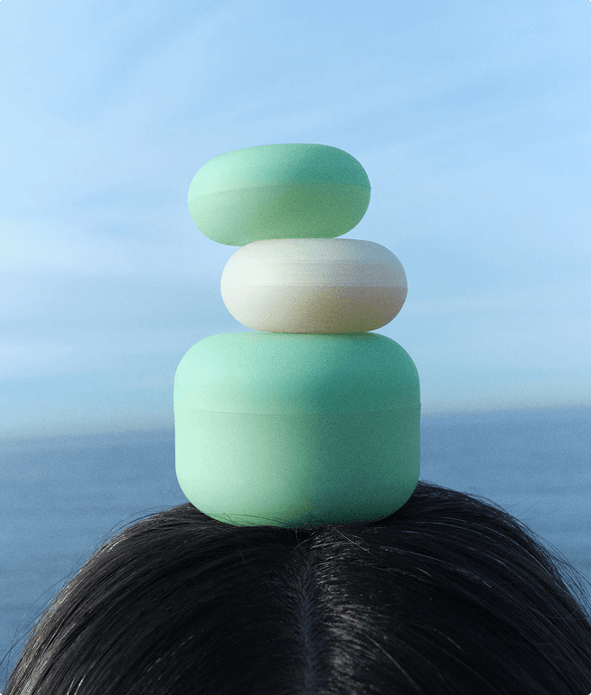 Stacked wellness products on head